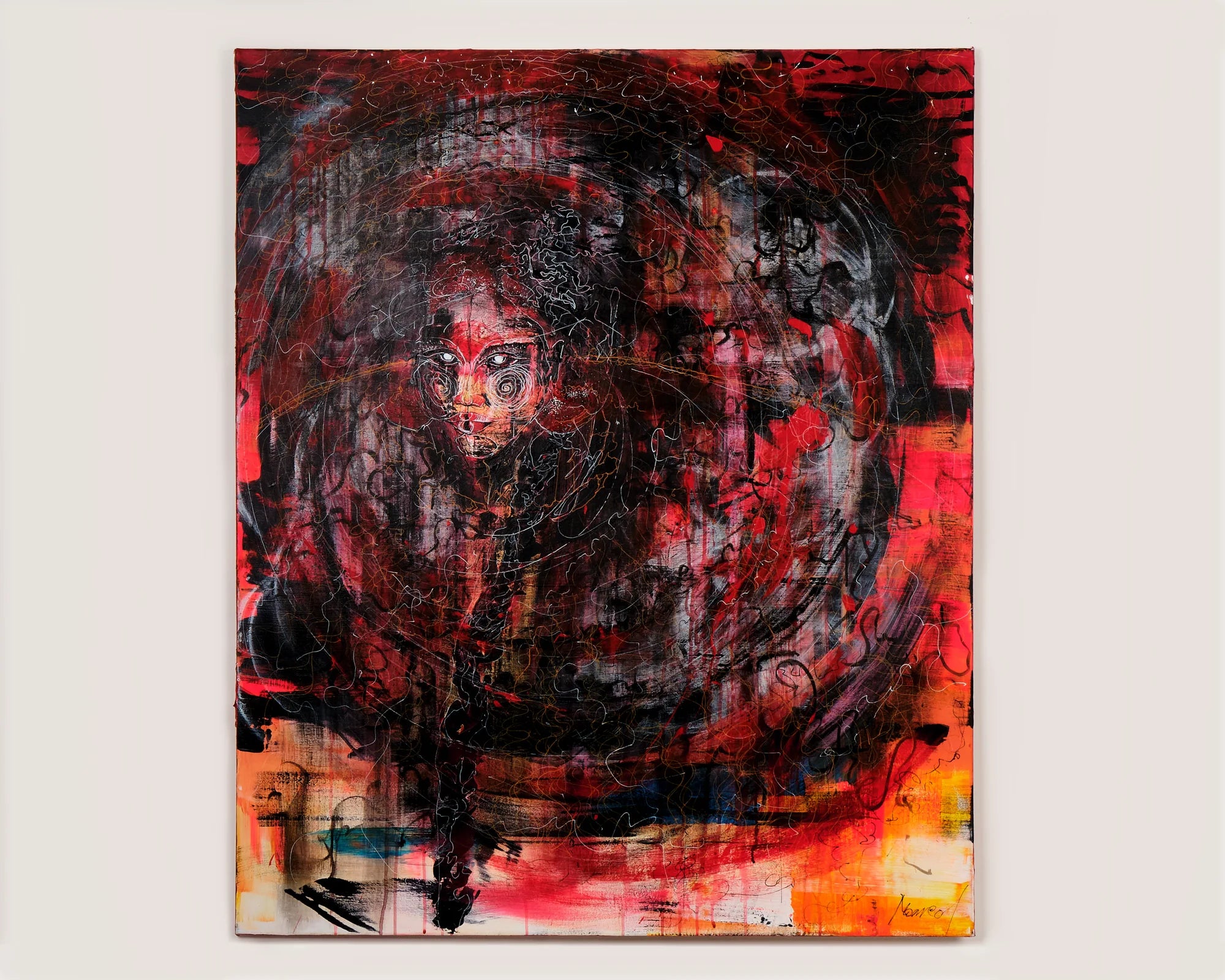 Red and black abstract painting photographed in the studio