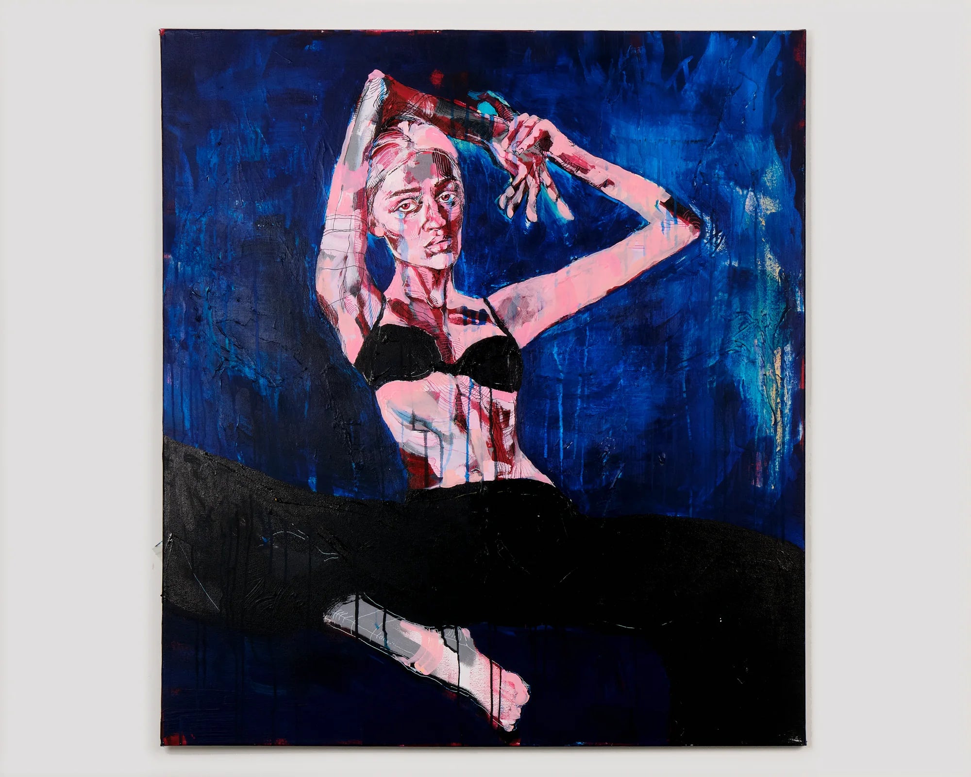 Blue figurative painting of a reclining woman